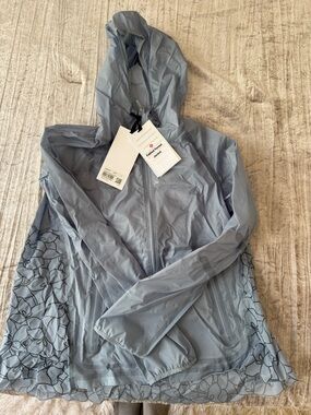 lululemon athletica Light Blue Hooded Jacket with Floral Mesh Hem